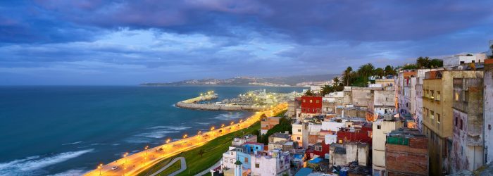 Aerial view of cityscape Tangier surrounded by buildings and water An aerial view of cityscape Tangier surrounded by buildings and water